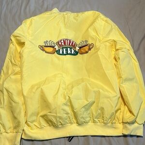Never worn Yellow FRIENDS jacket . Central Perk on back